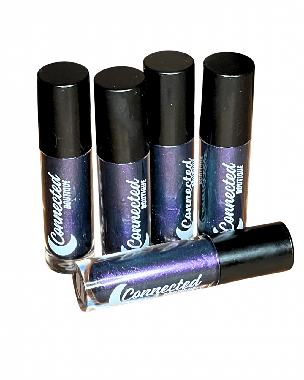 Astradrip duochrome lipgloss purple blue green shift with apple scent