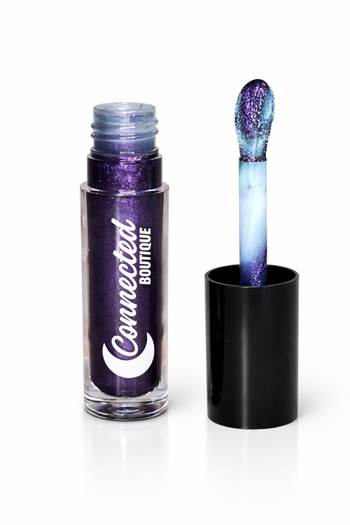 Astradrip duochrome lipgloss purple blue green shift with apple scent